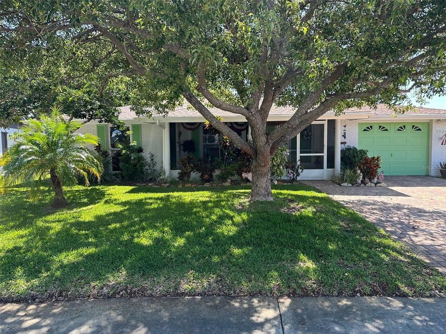 Charming 3BR/2BA Home in Magnolia Valley – New Port Richey
Explore the charm and curb appeal of this beautifully maintained single-story home nestled in Magnolia Valley, just minutes from downtown New Port Richey and Sims Park. From the moment you arrive, the paver driveway and inviting entry reflect true pride of ownership, enhanced by hurricane-impact front windows and shutters on main bedroom for added peace of mind.
Step inside through the screened front porch and enjoy views of the spacious 12x16 enclosed lanai, overlooking a fully fenced, beautifully landscaped backyard with mature plantings—perfect for relaxing or entertaining. A storage shed adds extra convenience.
The home features a desirable split floor plan, with two bedrooms and a full bath on one side and a private primary suite on the other. Inside, you’ll find tile and laminate flooring throughout and updated bathrooms with a new tub and modern European-style toilets. The kitchen is updated with refreshed cabinetry, stainless steel appliances, and a full pantry for ample storage.
Additional highlights include an extended one-car garage providing extra storage or workspace and no HOA, offering flexibility and fewer restrictions.
Major upgrades include a new roof (2022) with added insulation and hurricane straps, a new A/C system (2024), Leaf Filter gutters, a privacy PVC fence, sprinkler system with irrigation well, water softener, new garage door and opener, and fresh exterior paint, with many improvements offering transferable warranties.
This move-in-ready home offers comfort, functionality, and exceptional value in a convenient location.
Schedule your private showing today!