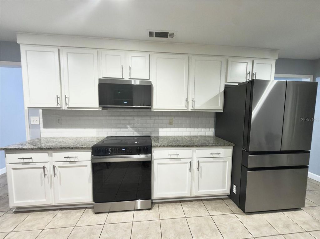 Photo of 9989 Leahy Road, Jacksonville, FL 32246 (MLS # NS1087746)