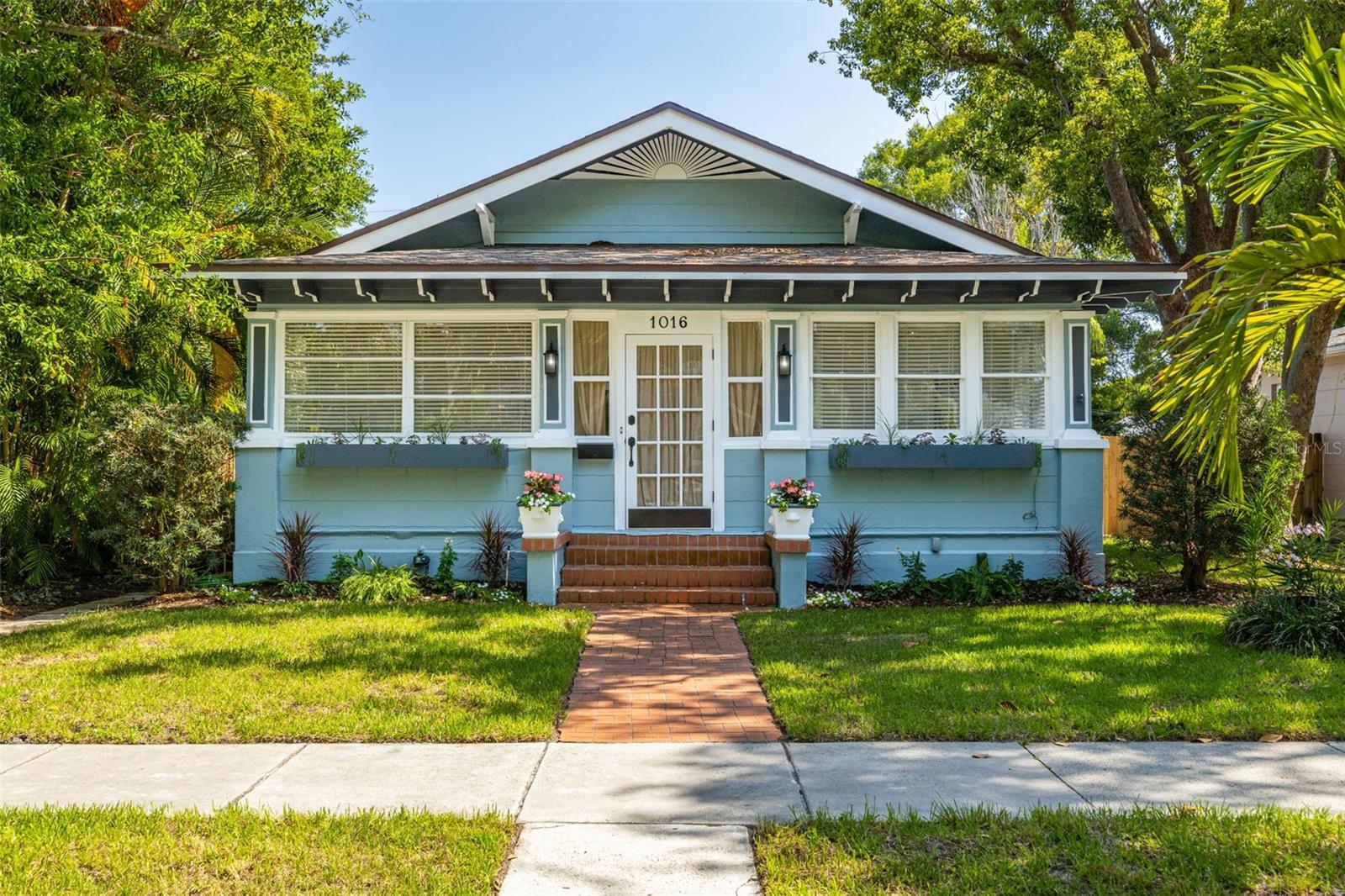 This charming Craftsman Bungalow combines historic character with modern updates and is in the highly desirable Greater Woodlawn neighborhood. The home offers three spacious bedrooms and two full bathrooms, with over 1,500 square feet of beautifully maintained living space. From the moment you arrive, you’re welcomed by a lovely screened front porch and classic bungalow architecture. Inside, you’ll find original Heart Pine floors, 9-foot ceilings, and tasteful finishes throughout. The spacious kitchen is outfitted with high-quality cabinetry, quartz countertops, stainless steel appliances, a center island, and generous storage. A formal dining room, a cozy living room with a fireplace, a bright sunroom, and a dedicated office provide comfort, function, and flexibility. The home also features an interior laundry room, abundant closet space and garage storage. Step out back to relax on the expansive wraparound screened porch or entertain on the private deck in your fully fenced backyard. Plenty of on-street parking is available in front of the home. Best of all, the property is not situated in Flood or Evacuation Zones. Woodlawn is a quiet, walkable neighborhood, that is close to Crescent Lake Park, Downtown St. Pete, shops, dining, entertainment, and the beaches. With quick and easy access to I-275 Tampa is just minutes away. This one-of-a-kind rental combines style, space, and location in one of St. Pete’s most charming areas. Don’t miss your chance to call it home. Contact me today to schedule a showing.