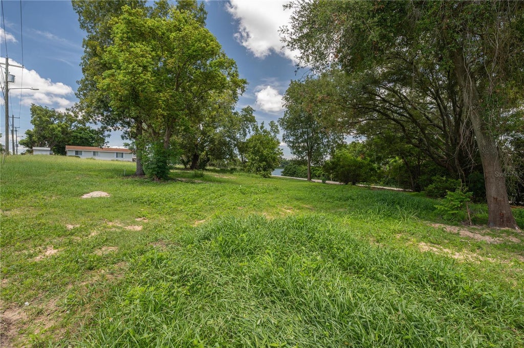 Photo of 504 E Main Street, Dundee, FL 33838 (MLS # P4939568)