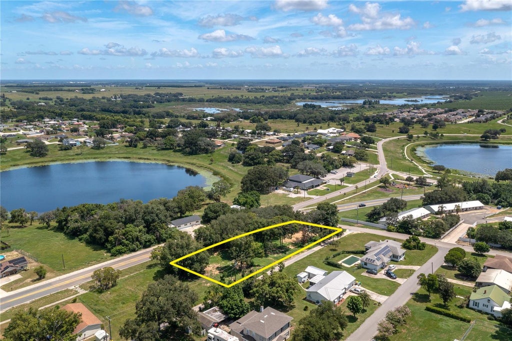 Photo of 504 E Main Street, Dundee, FL 33838 (MLS # P4939568)