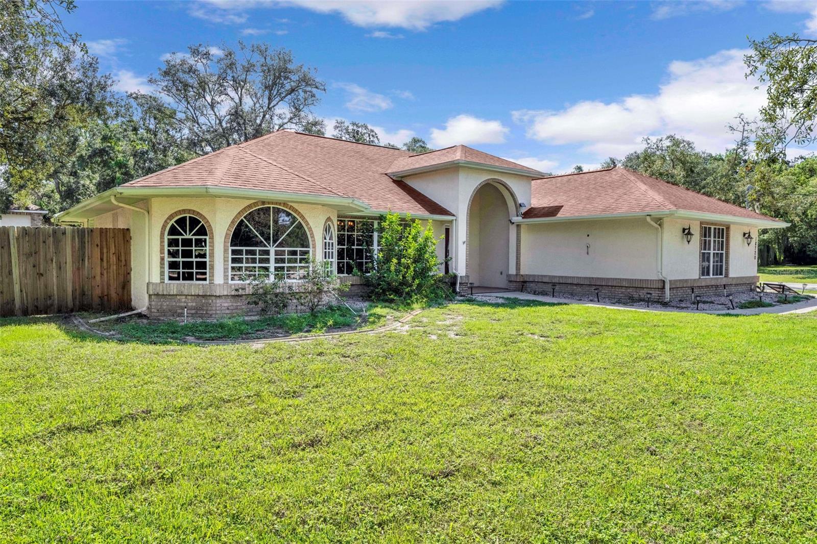 Discover comfort and convenience in this 3 bedroom, 2 bath home built in 1992, perfectly situated on a spacious 1-acre lot in a quiet and friendly neighborhood. The home features an open floor plan with modern LVP flooring throughout, creating a bright and inviting atmosphere.
Enjoy a large kitchen that flows seamlessly into the living and dining areas—perfect for everyday living or entertaining. Step outside to your private pool, ideal for summer relaxation. A detached workshop / garage with electricity adds space for vehicles, hobbies, storage, or projects.
This property is on well and septic, helping keep utility costs manageable. With plenty of outdoor space, it’s a perfect blend of privacy and convenience. Located in a community of 1 acre lots and just minutes from shopping, dining, and everyday essentials.
Move-in ready and waiting for its next owner—schedule a showing today!
