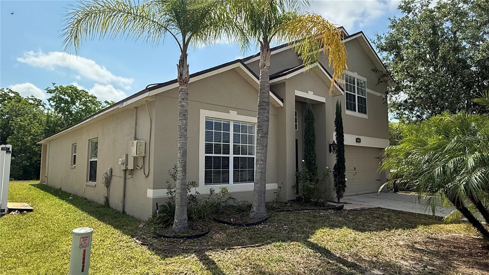 Step into this beautiful two-story residence in the sought-after Kissimmee area, featuring 4 bedrooms and 2.5 bathrooms. Designed with both comfort and elegance in mind, this home offers the perfect setting for family living. As you enter, you’re welcomed by a distinct formal living room and dining space — an ideal spot for hosting dinners or special celebrations. The inviting family room provides the perfect place to unwind or enjoy time with loved ones. The open-concept kitchen is a true highlight, equipped with sleek stainless steel appliances, abundant cabinetry, generous counter space, and a spacious pantry for all your storage needs. The primary suite, conveniently located on the main floor, features a walk-in closet and a private bathroom with dual sinks, a glass-enclosed shower, and a luxurious garden tub. Upstairs, you’ll find a versatile bonus room that’s perfect as a home office, hobby space, or playroom, along with three comfortable guest bedrooms and a full shared bathroom. Additional features include a dedicated laundry room, a two-car garage with ample storage, and a covered Lanai overlooking a large backyard — ideal for outdoor gatherings and relaxation. Don’t miss your chance to call this gorgeous Kissimmee property your home. Arrange a private tour today!