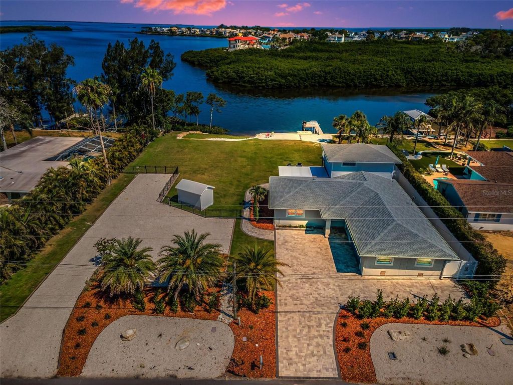Photo of 1620 Sea Breeze Drive, Tarpon Springs, FL 34689 (MLS # W7886130)