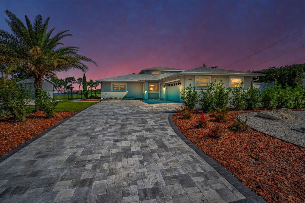 Photo of 1620 Sea Breeze Drive, Tarpon Springs, FL 34689 (MLS # W7886130)