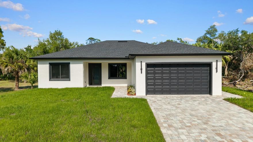 New Construction. Canal Front. Under $400K. Offered "As Is"  because when everything is brand new, the product speaks for itself.
42 Venango St delivers what most buyers spend months searching for, a brand new canal front home with premium finishes, thoughtful design, and a price point that still makes sense in today's market.
At 1,683 square feet, this residence lives far larger than the number suggests. Soaring 10 foot ceilings, 8 foot interior doors, an open concept layout, and abundant natural light do what square footage alone cannot. Dark matte framed hurricane impact windows throughout, luxury vinyl plank flooring from entry to exit, and carefully selected finishes create a modern upscale feel that is becoming increasingly difficult to find in Charlotte County at this price.
The kitchen anchors the home with quartz countertops, custom shaker cabinetry, a center island, and seamless flow into the living and dining areas. Oversized sliding glass doors open directly to a covered lanai with a built in outdoor kitchen, decorative tile backsplash, ceiling fan, and unobstructed freshwater canal views. No rear neighbors. Ever.
Every bedroom connects to a bathroom, a layout that performs equally well for families, multigenerational living, or short term rental income. The primary suite features dual vanities and a walk in shower finished in large format tile.
This is not a production builder cutting costs behind the walls. This is the same builder, the same elevated standard, the same attention to detail visible up and down Venango St.
Gulf Coast beaches, dining, shopping, golf, parks, and boating access are all minutes away.
New construction canal front homes at this price do not sit long in Charlotte County. 
**Schedule your private showing today before someone else does.**
