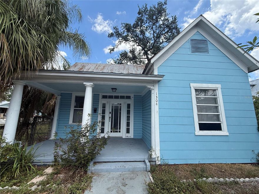 Located in V.M. Ybor, one of Ybor City’s primed communities within Tampa’s Urban Core, this 2-bedroom, 1-bath Folk Victorian-style home presents a unique opportunity for investors and renovators alike.

Set on a lot with 121 feet of depth, the property benefits from rear alley access, a valuable feature that adds flexibility and long-term potential. Internally, the home is ready for a full redesign and has remained largely unrenovated over the past 14 years. Existing improvements include updated electrical and gas service, fresh interior white paint, and newer light fixtures and ceiling fans in the living and dining areas.

A renovation will likely include updates to the kitchen, bathroom, windows, flooring, roof, and the addition of a central HVAC system. For the right buyer, the opportunity lies in both the location and the upside.

The property is also recognized as a contributing structure within the Ybor City Historic District. Buyers planning exterior improvements should consult with the Historic Preservation Commission to ensure proposed changes meet local design guidelines. Many exterior improvements can be approved administratively when designed within established guideline parameters.

V.M. Ybor is an award-winning neighborhood recognized for its civic engagement and community activism, helping drive major infrastructure improvements including the Columbus Drive and 14th Street redesigns. The property also offers convenient access to major Tampa destinations such as Armature Works, Tampa Riverwalk, Historic Ybor City, and the soon-to-be completed Gasworx development.

Whether continued as a long-term rental investment or transformed into a future primary residence, this property offers strong potential in one of Tampa’s evolving historic neighborhoods. Schedule your showing today.