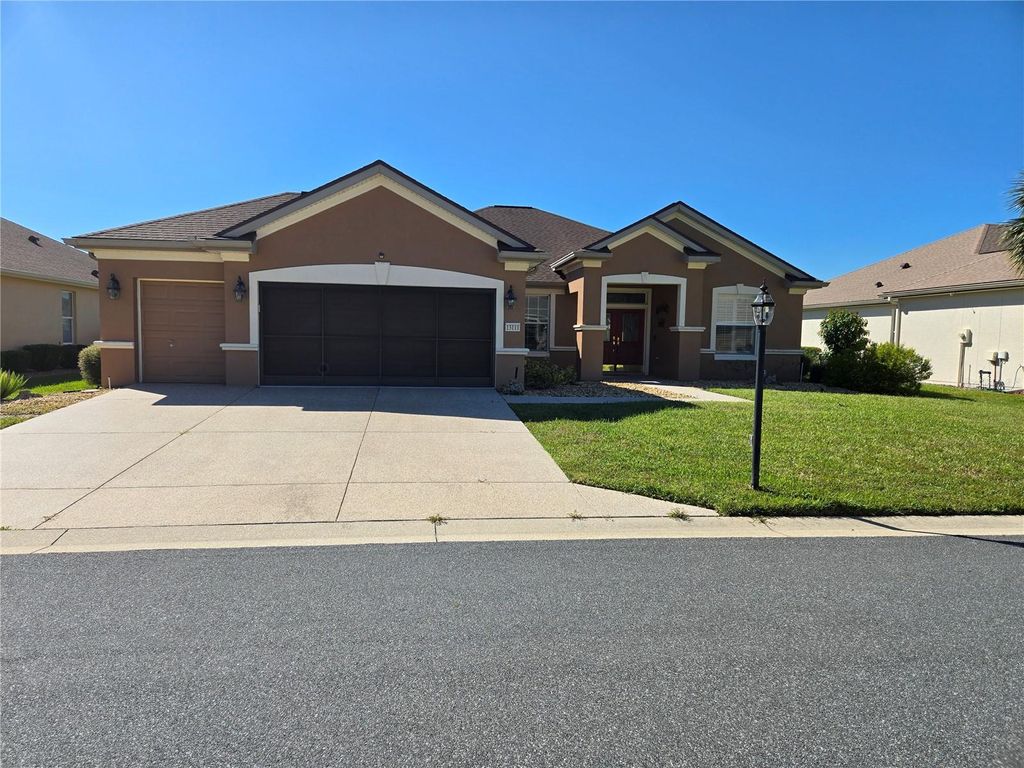 Photo of 13111 SE 86th Circle, Summerfield, FL 34491 (MLS # OM711544)
