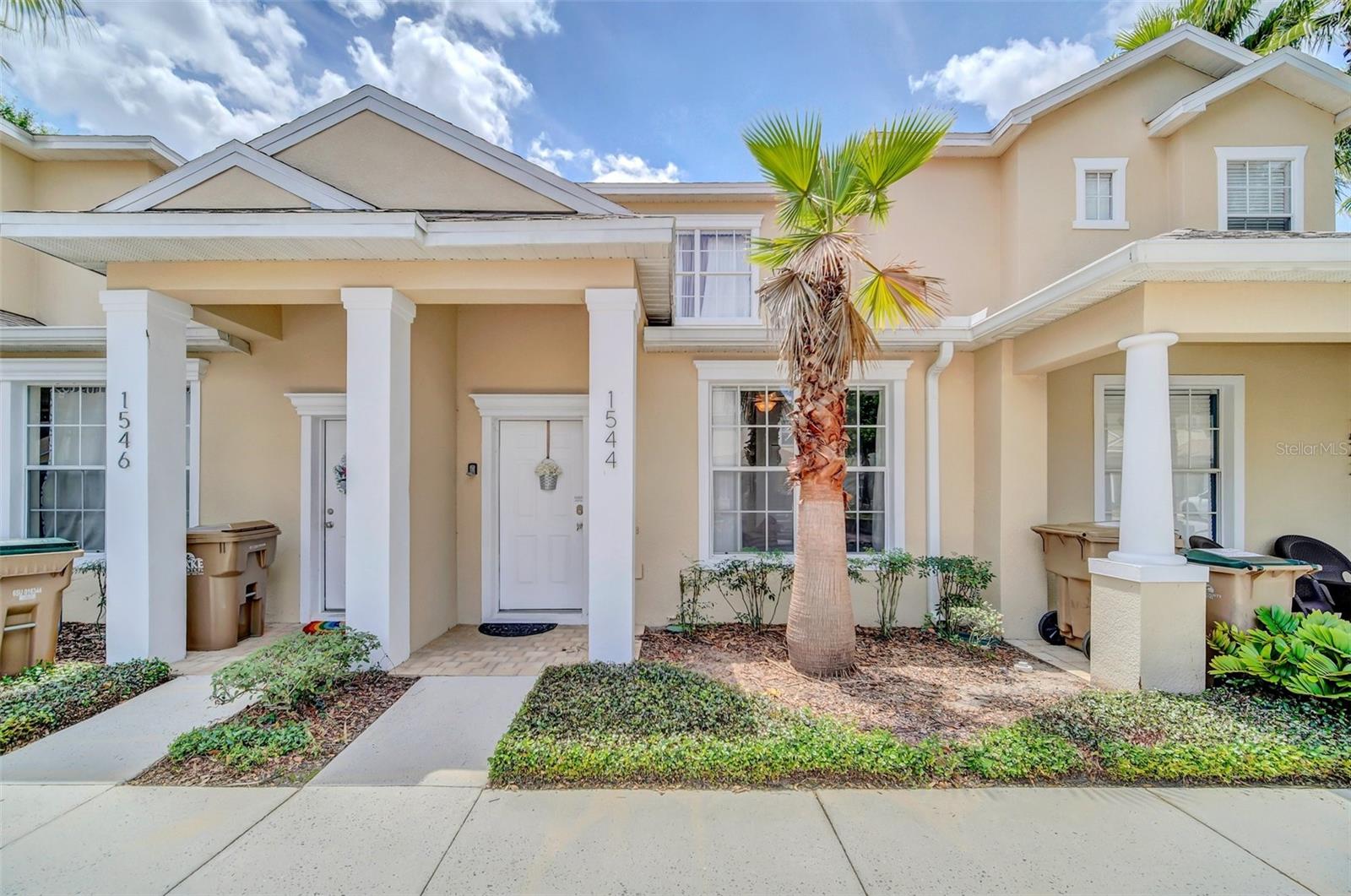 Looking to either own or purchase a house to rent near the theme parks?! Then check out this fully furnished townhome! The community allows vacation rentals. The kitchen features plenty of room to gather at either the breakfast bar or eat in area in the kitchen. The kitchen and family room flow into one another and look out onto the screened in lanai with your own private pool. The remodeled kitchen features granite countertops, pendant lights, 42" cabinets and stainless steel appliances; the stove has recently been replaced. The laundry room is on the first floor and includes front load Samsung washer & dryer. The spacious owner's suite features laminate flooring along with a walk-in closet and a bathroom with a new vanity granite countertop. Two additional bedrooms adjoin full bathrooms with new vanities and granite counters, offering plenty of room for family and guests. There's a balcony off of the upstairs owner's suite bedroom with great views. The community features a resort-style swimming pool with spa, game room, fitness center, and playground. Call to schedule your private showing today!
