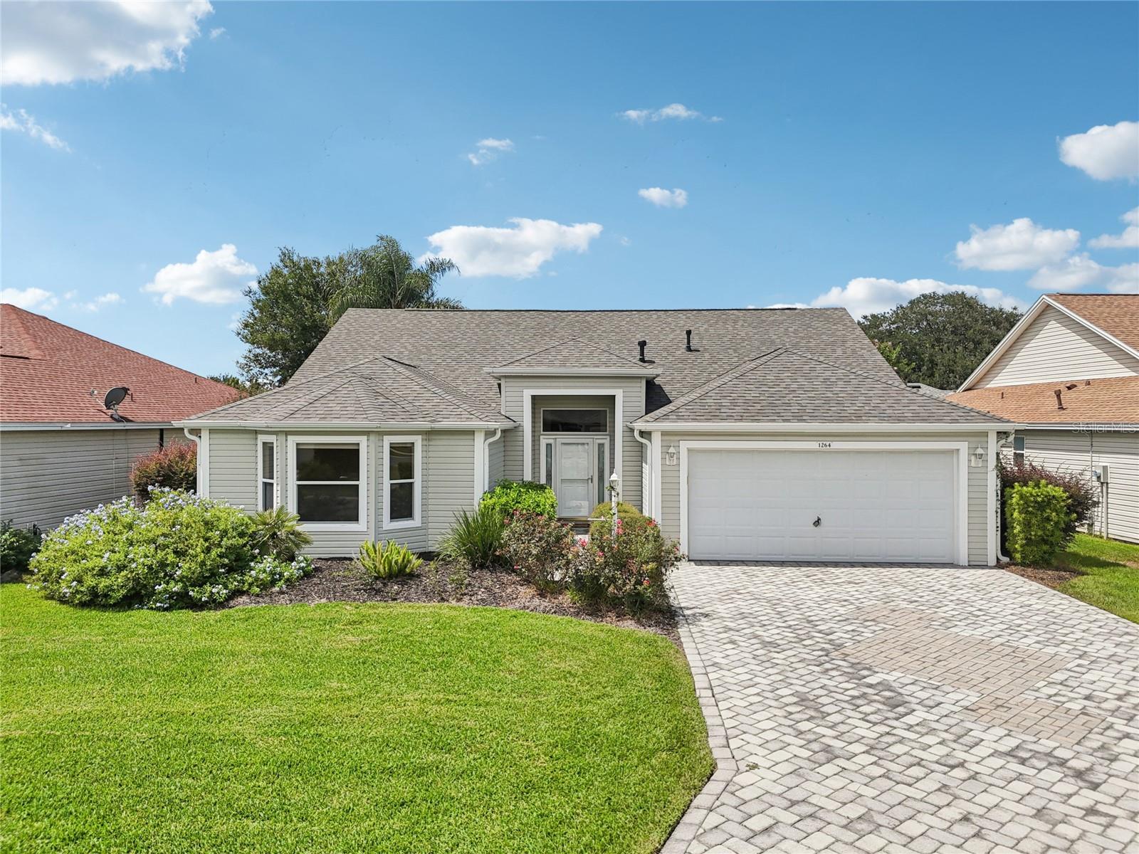 Welcome to 1264 Niles Ct., where upscale elegance meets effortless Florida living. WITH NO BOND! This impeccably upgraded 3-bedroom, 2-bath masterpiece isn’t just a home—it’s a lifestyle statement.
Step into a space that stuns from the very first glance. The chef-caliber kitchen is a showstopper, outfitted with top-of-the-line Viking and Bosch appliances, glistening solid surface countertops, and gorgeous custom cabinetry that blends beauty with smart design. Whether you're plating hors d'oeuvres or crafting a culinary masterpiece, this kitchen is a dream come true.
Throughout the home, designer Hunter Douglas window treatments add a tailored touch, while brand new luxury vinyl plank flooring exudes warmth, elegance, and durability. Every corner whispers comfort, every finish reflects quality.
And it doesn’t stop there—this home has been thoughtfully enhanced with a 2022 roof, 2017 HVAC, and a premium whole-home water treatment system, giving you peace of mind and peak performance behind the scenes.
Bathed in natural light and thoughtfully laid out, the open-concept design creates the perfect blend of flow and function. Whether you're entertaining guests, unwinding after a day on the course, or enjoying a quiet evening with a glass of wine, this home rises to every occasion.
Located in the heart of The Villages, you're moments away from golf, pools, dining, and entertainment—but you may never want to leave this stunning retreat.
Luxury is more than a label—it’s a feeling. And you’ll feel it here. Welcome home.