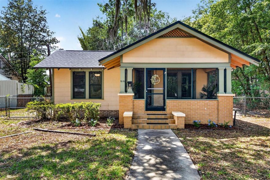 Quintessential Bungalow built in 1926, just two blocks to "The Duck Pond".  This two bedroom, one bath, charmer has spacious rooms, loads of windows, and a screen front porch across the front of the home with a bead board ceiling.  This home is a rare find with original wood floors in great condition, original interior doors and door hardware, original sash windows, along with original millwork throughout the home.  The kitchen has a washboard sink under a bright window.  You will be amazed at the number of cabinets in this vintage kitchen.  There is an island on wheels for food prep, or bar stools for hanging out. The bathroom has an antique tub and a vanity with a mirror tucked into a cupboard.  The home has been lovingly cared for and it shows. Situated on a large, deep lot graced with an amazing Live Oak tree, and completely fenced providing a private setting.  The unfinished "Carriage House" currently houses the washer and dryer. Since this home is not located in "The Historic" district it will be easier to finish out the Carriage House.  It is approximately 18 x 24 and has a concrete slab floor.  Potential for an ADU, guest house, workshop, etc.  The home has been re-plumbed, roof was replaced 10/11/2022, HVAC replaced 4/24/2017.  The home has been rewired and the electric panel updated.  The home is move-in ready and passed a 4 Point Inspection last year. The Duck Pond neighborhood is one of the amazing treasures of Gainesville.  Walk to downtown restaurants, Hippodrome theatre, festivals, parks, and shops. This home is in amazing condition.  Request your tour today!