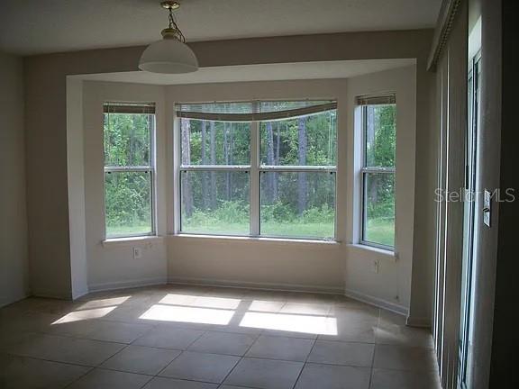 Photo of 72 Rollins Lane, Palm Coast, FL 32164 (MLS # O6431247)