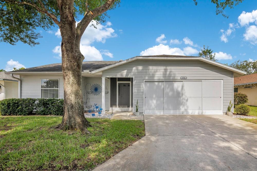 Updated & Move-In Ready 2BR/2BA Golf Course Home in Pennbrooke Fairways! This quiet, furnished home offers an open floor plan with vaulted ceilings, new laminate flooring (2024), and plenty of natural light showcasing the stunning golf course view. The spacious living area flows to the enclosed lanai—perfect for relaxing or entertaining—while the primary suite and guest bedroom each feature walk-in closets. Recent updates include roof and HVAC (2019), new water heater, A/C condenser, disposal (2025), updated lanai windows (2025), and garage screens (2025). The 2-car garage provides abundant storage, and the end-of-street location offers bonus parking with no through traffic. Pennbrooke Fairways is a vibrant 55+ gated community with golf, pickleball, tennis, water volleyball, line dancing, over 100 activities, plus HOA-covered cable, internet, and lawn service. Just minutes from The Villages, shopping, and dining, this home delivers both comfort and the active retirement lifestyle you’ve been looking for!