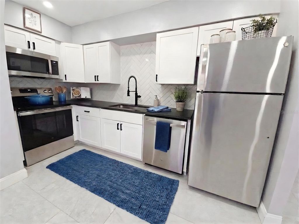 Photo of 2941 Shore Drive, Safety Harbor, FL 34695 (MLS # TB8493466)