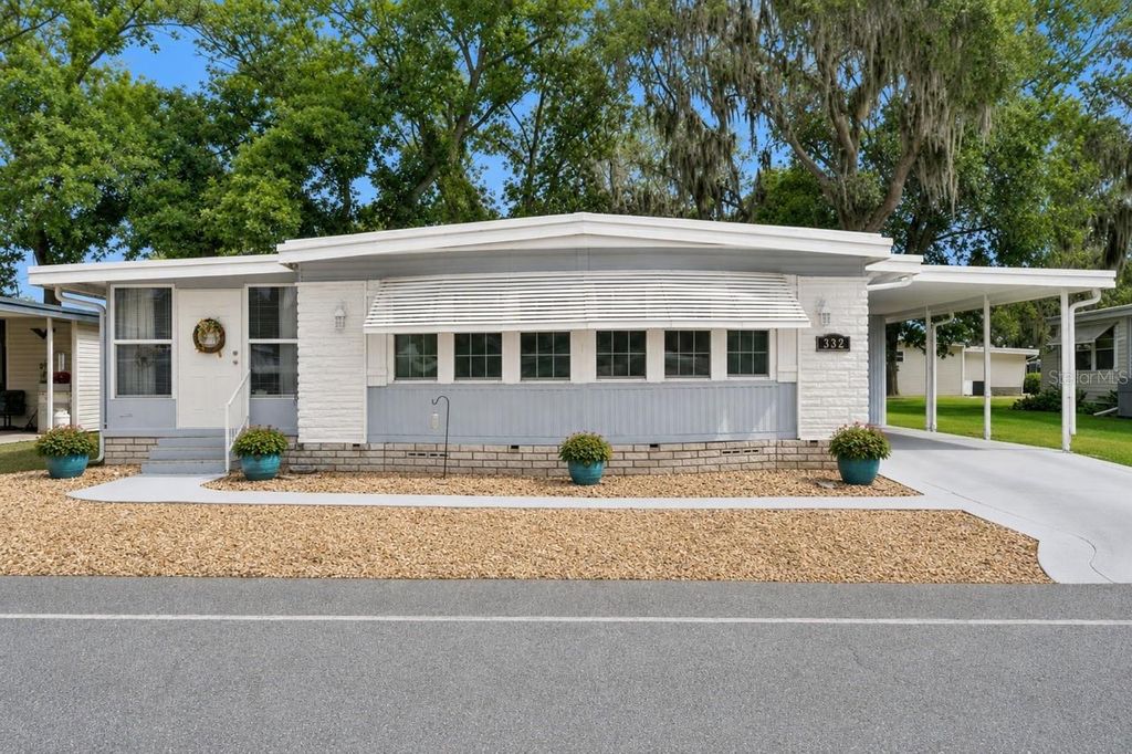 Photo of 332 Hawthorne Boulevard, Leesburg, FL 34748 (MLS # O6407980)