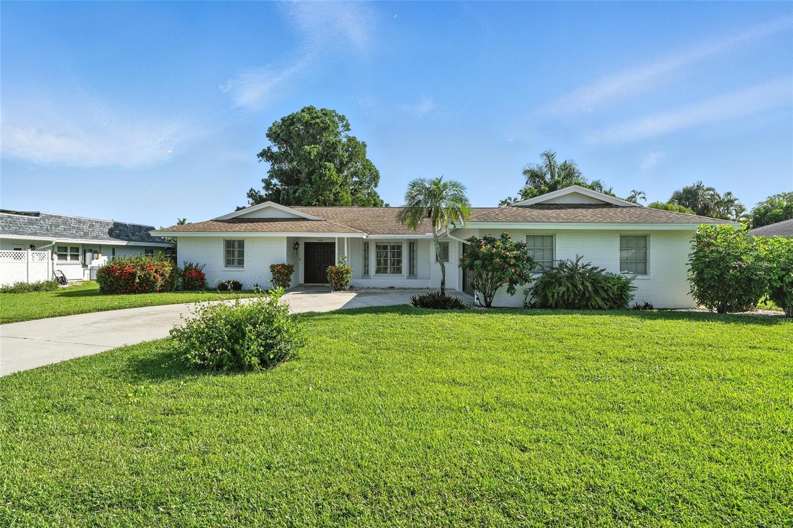 Welcome to this beautifully updated 3-bed, 2-bath home in the highly sought-after Whiskey Creek neighborhood of Fort Myers. Sitting on an oversized lot with great curb appeal, this nearly 1,700 sq ft home offers a bright, open layout perfect for entertaining or relaxing. Enjoy a modern kitchen with stainless steel appliances and remodeled spa-like bathrooms. The split-bedroom floor plan offers privacy, with a spacious primary suite and two versatile guest rooms.
Large sliders lead to a fully fenced backyard with a paved patio ideal for outdoor dining or lounging in the Florida sun with plenty of room for a pool. Recent upgrades include a newer roof, A/C, water heater, appliances, fresh exterior paint, and no storm damage from past storms.
Whiskey Creek offers a golf cart-friendly lifestyle, optional $125/yr HOA, nearby Whiskey Creek Country Club offers golf and social memberships at affordable rates. Whiskey Creek is close to beaches, shopping, dining, and top-rated schools. Don’t miss this move-in-ready gem, schedule your private showing today!