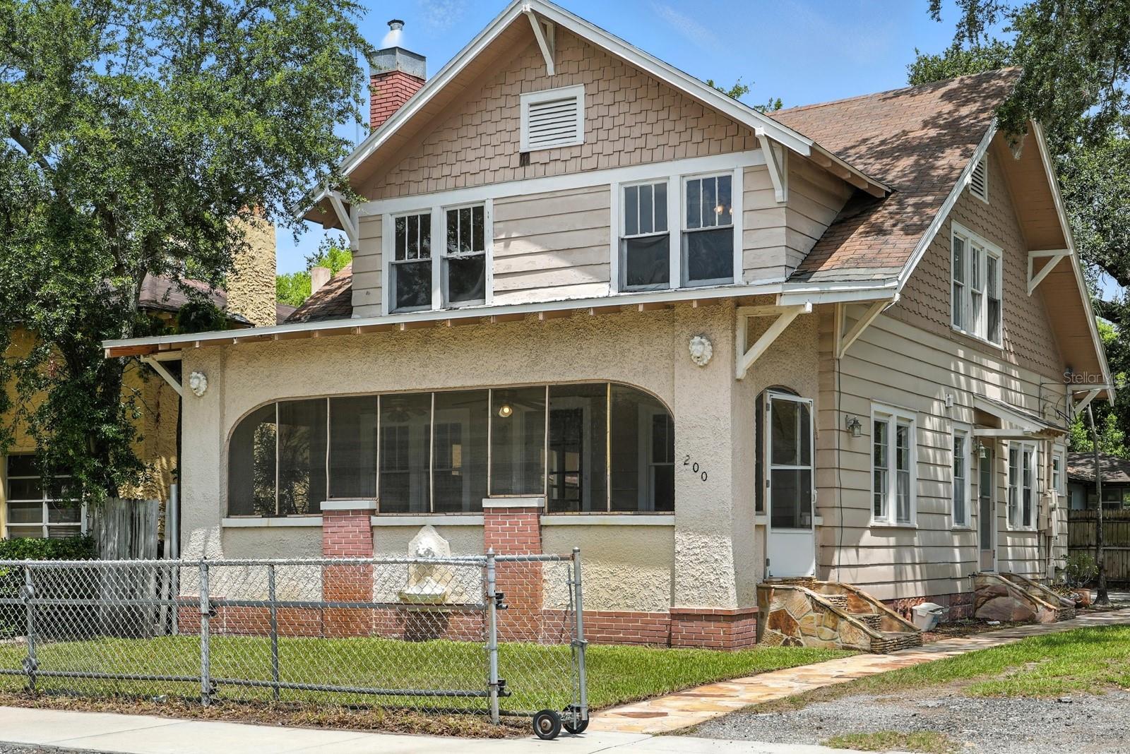 This beautifully preserved home offers the perfect combination of historic charm and modern convenience, located just minutes from the beach and close to downtown. Thoughtful updates include a brand new HVAC system, tankless water heater, and updated plumbing and electrical—providing peace of mind without compromising character.
Step inside to find original hardwood floors that add warmth and charm throughout. The flexible floorplan includes a spacious main-level flex room with its own full bathroom—ideal for guests, a home office, a 5th bedroom or playroom. The kitchen was fully renovated in 2018 and is complemented by a bright, functional laundry space on the first floor.
Upstairs features generously sized bedrooms, a second full bath, and a loft-style storage area. The basement includes a finished one-room space with a private exterior entrance, offering endless possibilities for use. This home has been well cared for inside and out.