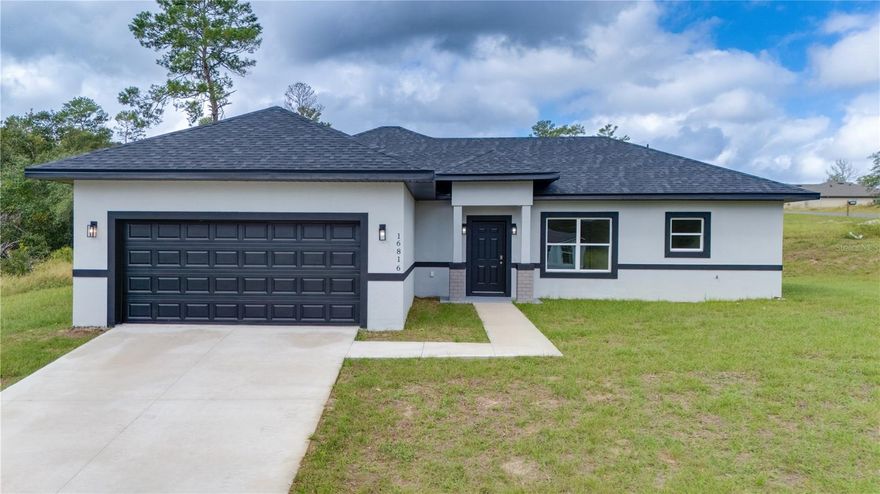 Step into this stunning home on a desirable corner lot in Marion Oaks a true showcase of modern living. With 4 spacious bedrooms and 2 full baths, this home blends comfort, functionality, and contemporary style in all the right ways. From the moment you walk in, the open floor plan invites you to relax or entertain with ease. The flow from the kitchen to the living area creates the perfect space for family gatherings, casual dinners, or quiet nights in. And with luxury vinyl plank flooring throughout, there’s no carpet just easy-to-maintain floors that keep life simple.The kitchen steals the show with high European-style cabinets and quartz countertops sleek, modern, and right on trend. It’s a space that feels high-end. Step outside to the covered lanai and you’ll see why this home is built for real living perfect for Sunday BBQs, birthdays, or just sipping your morning coffee. Built with solid block cement, this home offers lasting quality and peace of mind. It’s modern, stylish, and move-in ready for its next resident.