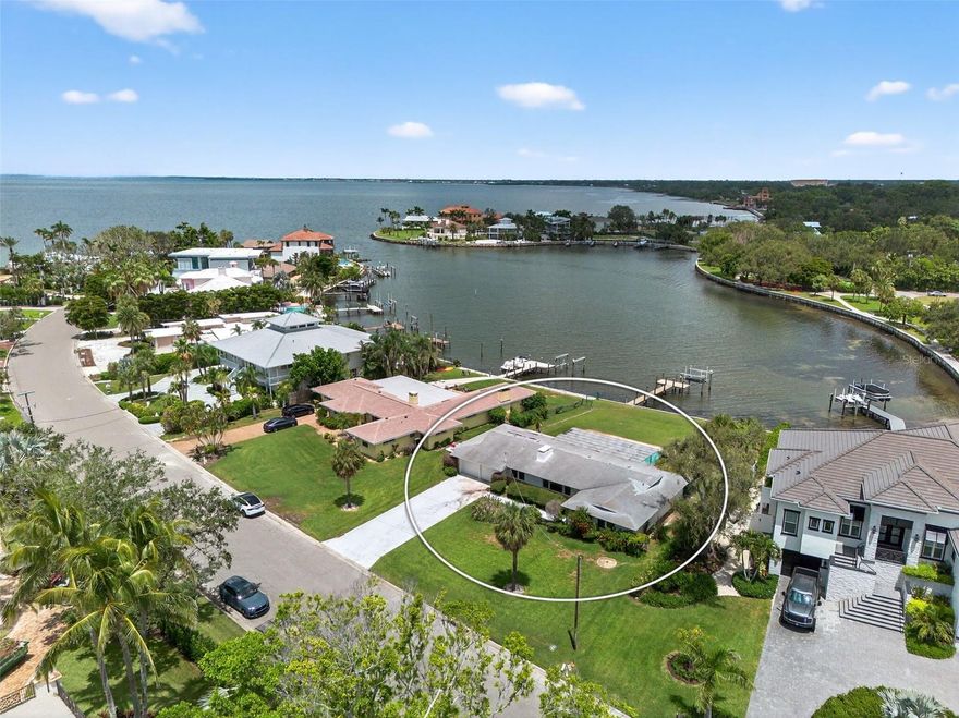 Amazing opportunity to create your waterfront estate in Sapphire Shores, where history, culture, and growth meet. This 16,378 sq. ft. lot offers 87 feet of water frontage, a private dock, and direct access to Sarasota Bay. Positioned along a quiet shoreline, it overlooks an almost 900-foot-wide deep-water basin, providing both privacy and natural beauty. Sapphire Shores combines legacy estates, striking new builds, and proximity to cultural landmarks such as The Ringling Museum and Asolo Theatre. With the North Trails ongoing transformation, including new developments, zoning updates, Ringling Colleges expansion the neighborhood is emerging as a prime location for luxury residences. Whether for a custom estate or a speculative project, this is a rare chance to secure a large waterfront property in one of Sarasota's most dynamic luxury neighborhoods.