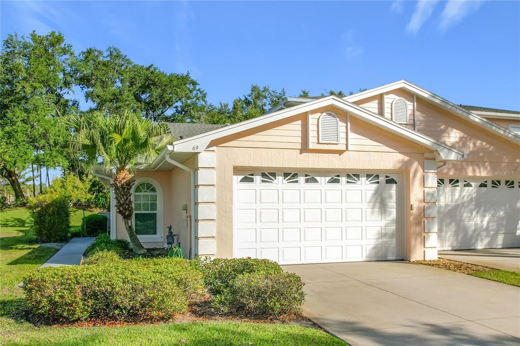 Photo of 69 Enclave Drive, Winter Haven, FL 33884 (MLS # S5148089)