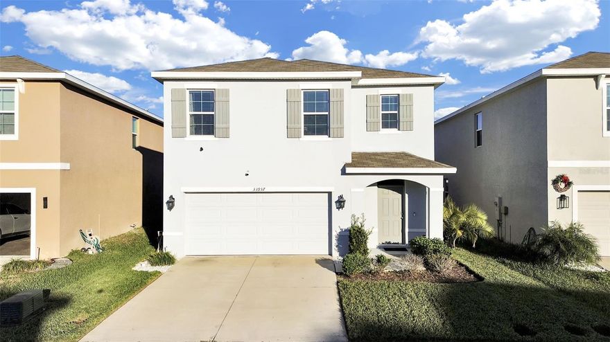 This 5 bed/ 3 bath immaculate home in Ashberry Village features tile & carpet floors, open floor plan, upgrades appliances & fixtures and W/D included. Large fenced backyard, covered patio with pavers and complete outside kitchen. Just few steps from Community Clubhouse! Convenient location in Wesley Chapel, just minutes from everything you need. Excellent schools!