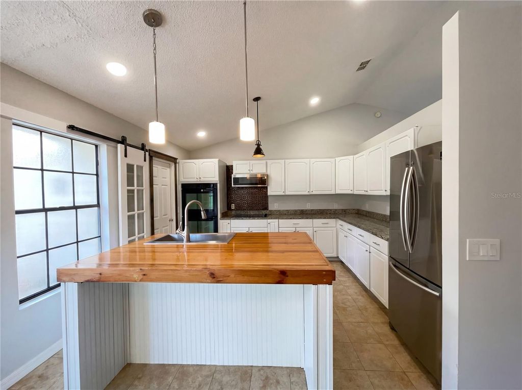 Photo of 2041 Spencer Street, Deland, FL 32720 (MLS # O6387341)