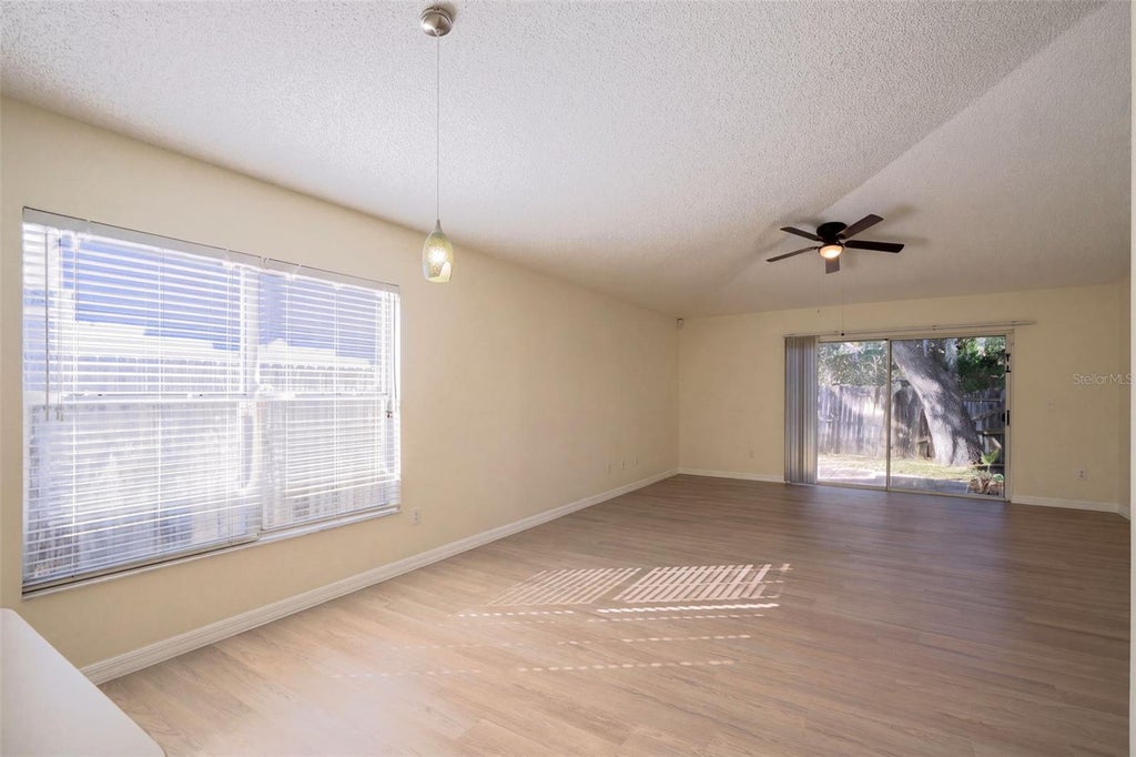 Photo of 10437 Sun Villa Boulevard, Orlando, FL 32817 (MLS # O6452255)