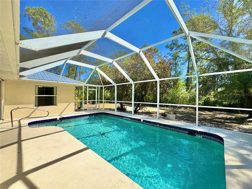 Photo of 1382 Maracaibo Street, Punta Gorda, FL 33980 (MLS # O6383942)