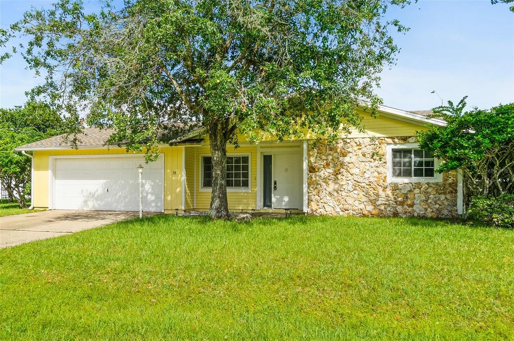 Photo of 38 Diamond Drive, Palm Coast, FL 32164 (MLS # FC321514)