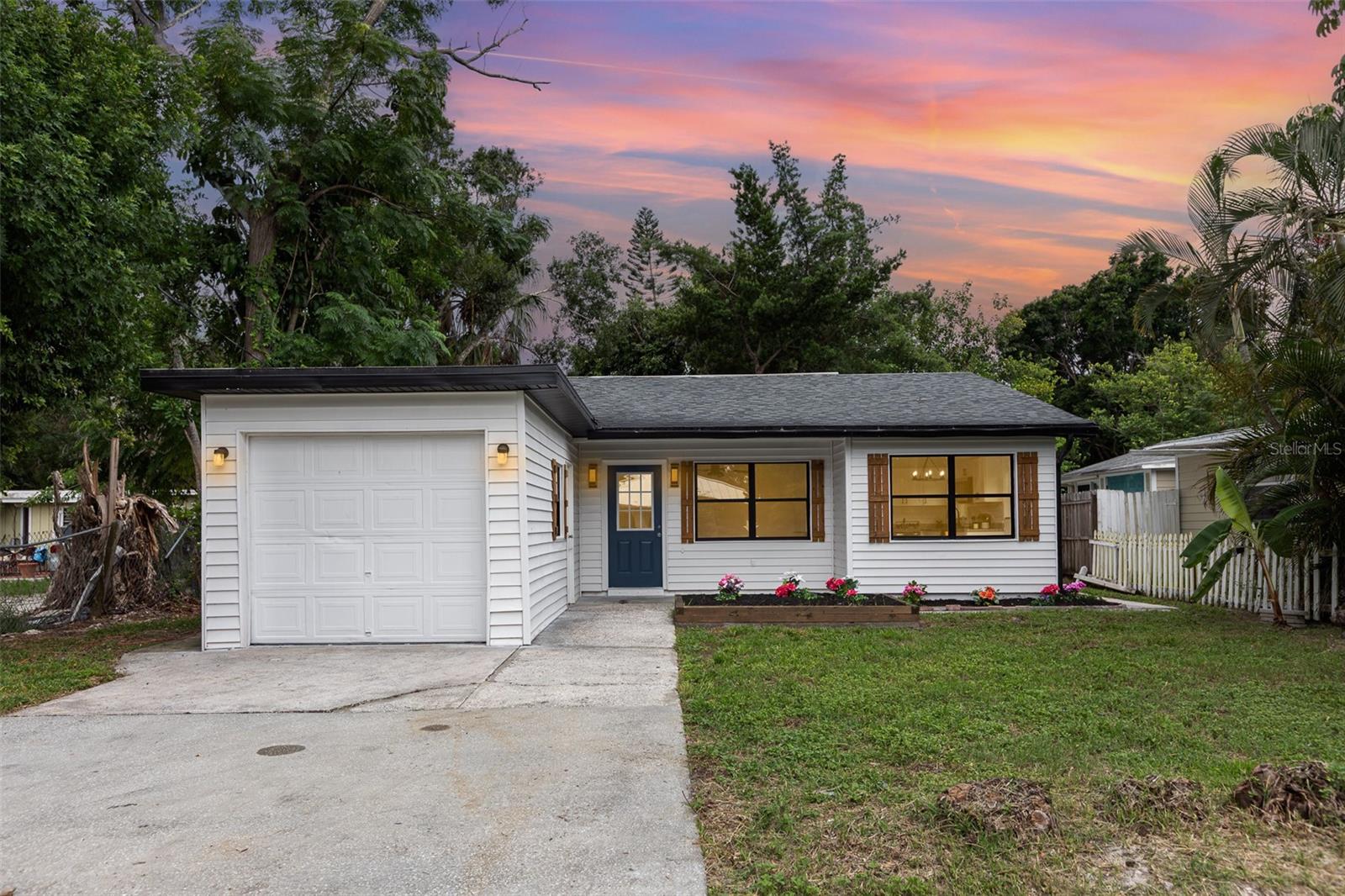 STOP!!! RIGHT! THERE! Are you a small family? Make this sweet home yours. 15 minutes away from Siesta Keys, one of the best beaches in Florida. Perfect for a starter-home, very family friendly. New LVP flooring, new bathrooms, new HVAC and water heater, new roof, new kitchen. A bonus room for a nursery or an office space. Fenced in backyard. No HOA. New countertops. Master room with sliding doors to outside, lovely for sipping tea after a long day of work or watching movies a rainy afternoon.