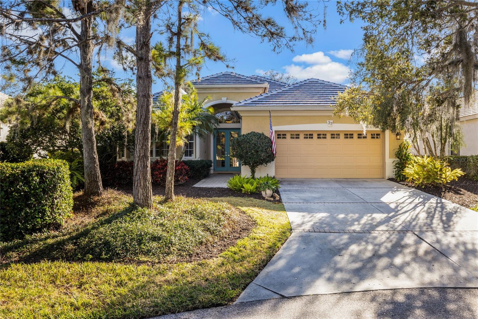 BRAND NEW ROOF 2024! This beautiful 3 bed/2ba home is located in BISHOPS COURT in the Oaks Preserve. Once through the 24 hour guarded security gate you will be treated to rich fauna, streets lined with canopy trees, nature and tranquility. This is a MAINTENANCE FREE community, with its own private pool and clubhouse for only the Bishops Court residents to enjoy . The home was designed and built by the highly regarded Lee Wetherington. As soon as you enter the front door your eyes are drawn to the beautiful view of the Preserve that the home backs up to giving you a private oasis for which to enjoy. The architectural details of the home are not to be missed with 14ft trey ceilings making the open plan living area seem vast. The master bedroom is a spacious retreat with his and her walk in closets and a bonus area for an office/library or work out space. The master bath is light bright and airy, with a beautiful separate oversized soaking tub to relax in. The floor plan offers room and privacy for the home owner and their guests with the 2 other bedrooms sharing a bathroom on the other side. The attention to detail is shown with many upgrades, plantation shutters, pull out shelving throughout the home, brand new appliances, gas stove and updates throughout. It is move in ready.
The Oaks Club is Sarasota's finest Golf and Country Club with numerous accolades. The amenities include 2 world class golf courses 12 Har Tru tennis courts, Croquet Well Fit Center, 4 Pickleball Courts, heated Junior Olympic sized pool. A brand new Grill room is almost completed and The Tavern and Blue Heron room offer fine dining in the evenings. There is an abundance of Clubs and Social activities something for everyone. The Oaks Club is a Platinum Club of America, Emerald Club of the World and Elite Distinguished Club of the World.
You will live minutes from the Legacy Bike Trail, a short drive to the beautiful sandy beach on Siesta Key. Oscar Scherer State Park is just around the corner, cultural downtown Sarasota is 20 minutes away, not to mention all the other activities that Gulf Coast living has to offer.
CLUB MEMBERSHIP IS AVAILABLE AND IS REQUIRED WITH PURCHASE. Paradise awaits. Bedroom Closet Type: Walk-in Closet (Primary Bedroom).