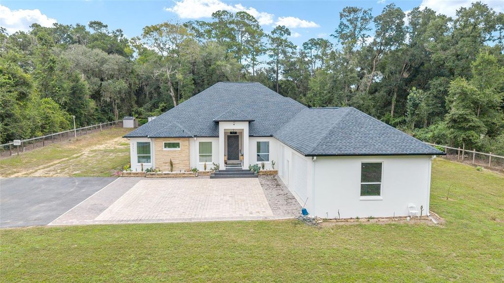 Photo of 9277 SW 27th Avenue, Ocala, FL 34476 (MLS # OM711716)