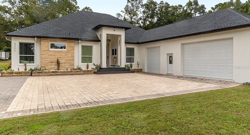 Photo of 9277 SW 27th Avenue, Ocala, FL 34476 (MLS # OM711716)