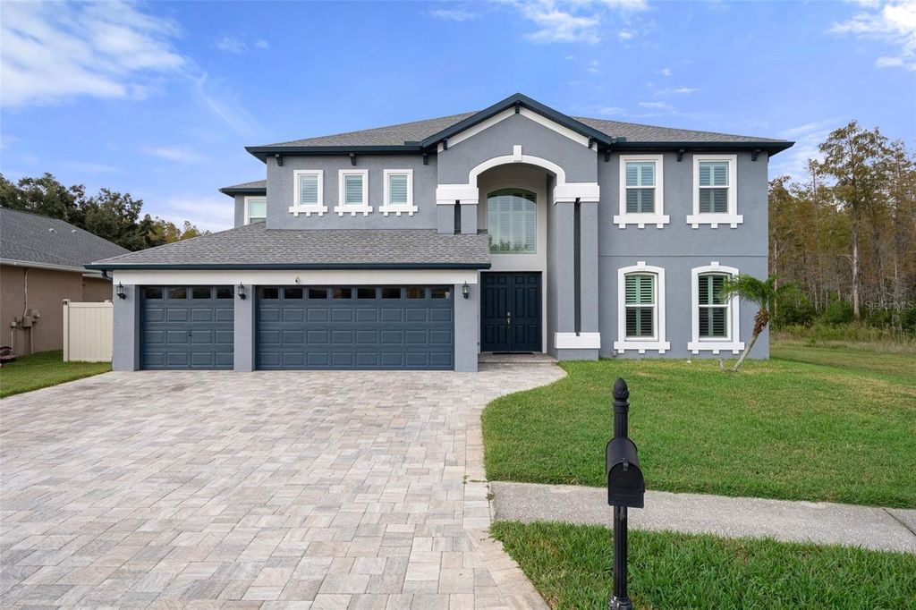 Photo of 3627 Barnweill Street, Land O Lakes, FL 34638 (MLS # TB8318332)