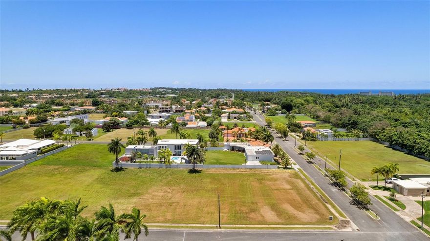 This prime half-hectare lot (2,100.50 m²) offers a rare opportunity to create your ideal retreat in one of Puerto Rico’s gated communities. Perfectly located near schools, restaurants, and luxury hotels, it also provides easy access to nature with the scenic Cerro Gordo trails just minutes away. The community amenities such as basketball and tennis courts, and the security of 24/7 gated access. Whether you're planning your forever home or a smart investment, this exceptional lot is ready to bring your vision to life.