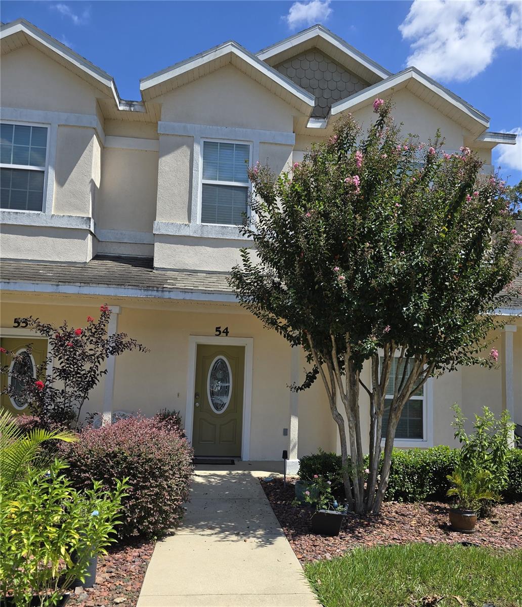 Excellent opportunity to own this spacious 3-bedroom, 2.5-bathroom condo offering nearly 1,500 sq. ft. of comfortable living. Nestled in the quiet, tucked-away community of Connemara in Newberry/Jonesville, you’ll enjoy a peaceful setting while being just minutes from shopping, dining, healthcare, and more. Step inside to a welcoming foyer that opens to the spacious Family and Dining Room on the right, seamlessly flowing into the kitchen. Just beyond the kitchen, you’ll find a convenient laundry room and pantry. The first floor features a generously sized Primary Bedroom with a private ensuite bath. A door opens directly from the bedroom to a screened patio, where you can relax and enjoy the beautifully landscaped garden filled with a variety of flowering plants. Upstairs, you’ll find two comfortable guest bedrooms and a full bath. The landing area offers a versatile space—ideal for a home office, reading nook, or creative corner. This meticulously maintained, move-in ready condo is filled with thoughtful architectural details that add charm and character creating a space that is both functional and inviting—perfect for making lasting memories. With an HOA fee of just $257/month, enjoy peace of mind with exterior maintenance—including roof, grounds, insurance, pest control, and private road care—taken care of for you.