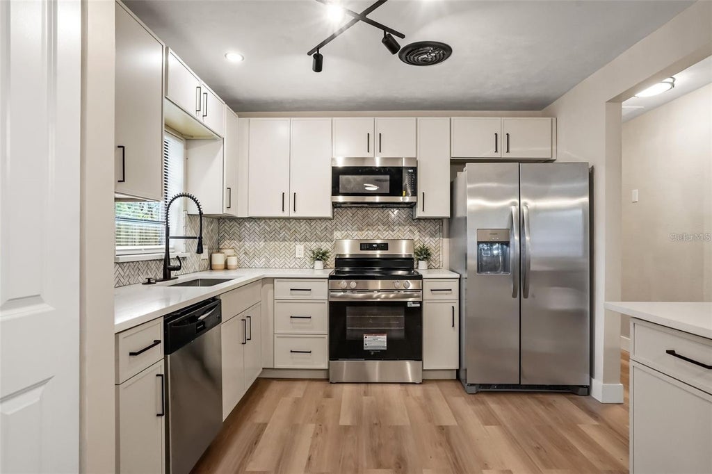 Photo of 1348 Radclyffe Road #A, Orlando, FL 32804 (MLS # O6451143)