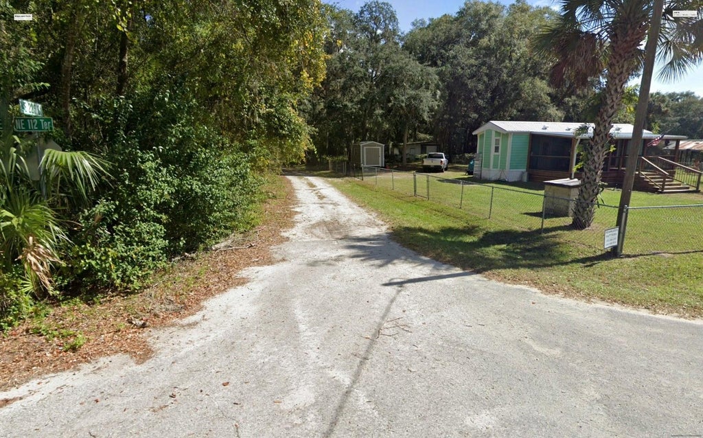 Photo of NE 112th Terrace, Fort Mccoy, FL 32134 (MLS # O6418292)
