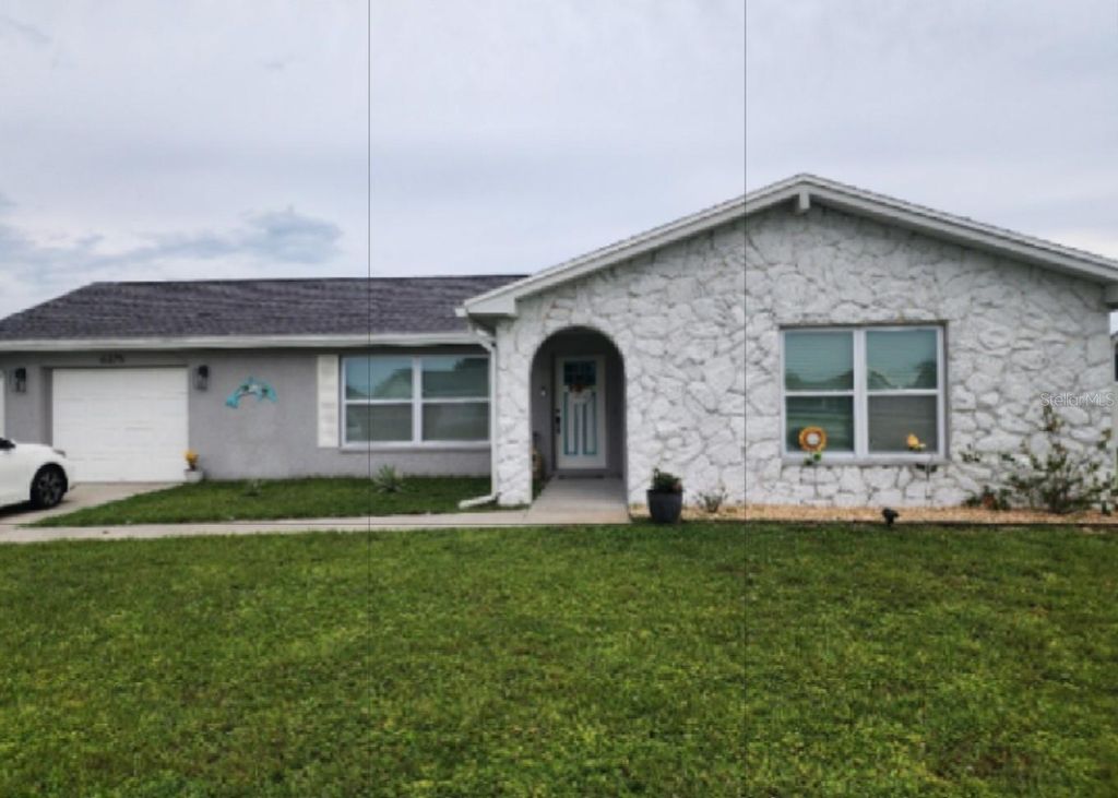 Photo of 6375 Coniston Street, Port Charlotte, FL 33981 (MLS # C7521582)