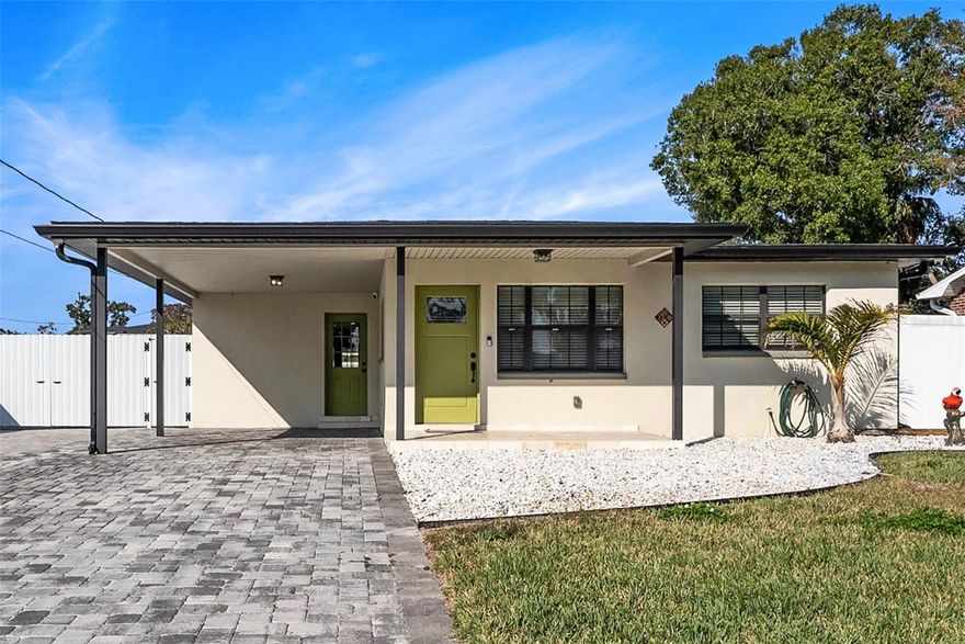 Beautifully remodeled with exceptional taste, this move-in ready home offers modern upgrades and complete peace of mind. Located in an area with no HOA, the property features a 2020 roof, 2018 A/C, and fully updated plumbing and electrical systems completed in 2020. All windows have been replaced with impact-resistant windows, enhancing safety and energy efficiency. The home offers 3 bedrooms and 3 full bathrooms, along with a spacious Florida room perfect for family gatherings or additional living space. Outside, the property truly stands out: an oversized paver driveway begins at the front of the home and extends along the entire left side, providing easy access to the backyard, ideal for parking boats, RVs, or additional equipment. The backyard also features a beautiful outdoor kitchen, fully equipped and perfectly positioned within the patio, overlooking a covered and paved terrace designed for year-round enjoyment. Ideally located for convenience and lifestyle, this home is just a short drive from Tampa International Airport and minutes from Downtown Tampa, providing quick access to top dining, entertainment, and cultural venues. It’s also close to premier shopping and restaurants at International Plaza and Bay Street, as well as major attractions including museums, waterfront parks, Tampa Stadium, beaches, and family-friendly activities. This home seamlessly blends comfort, functionality, and style. Don’t miss the opportunity to see it before it’s gone!