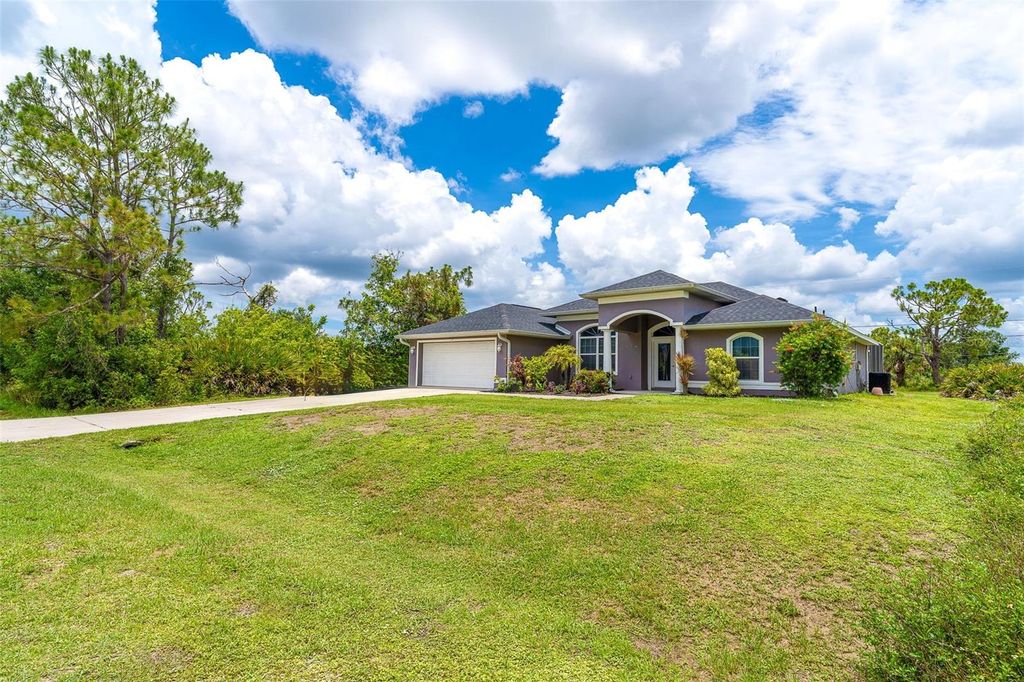 Photo of 7376 Stetson Lane, Port Charlotte, FL 33981 (MLS # D6142861)