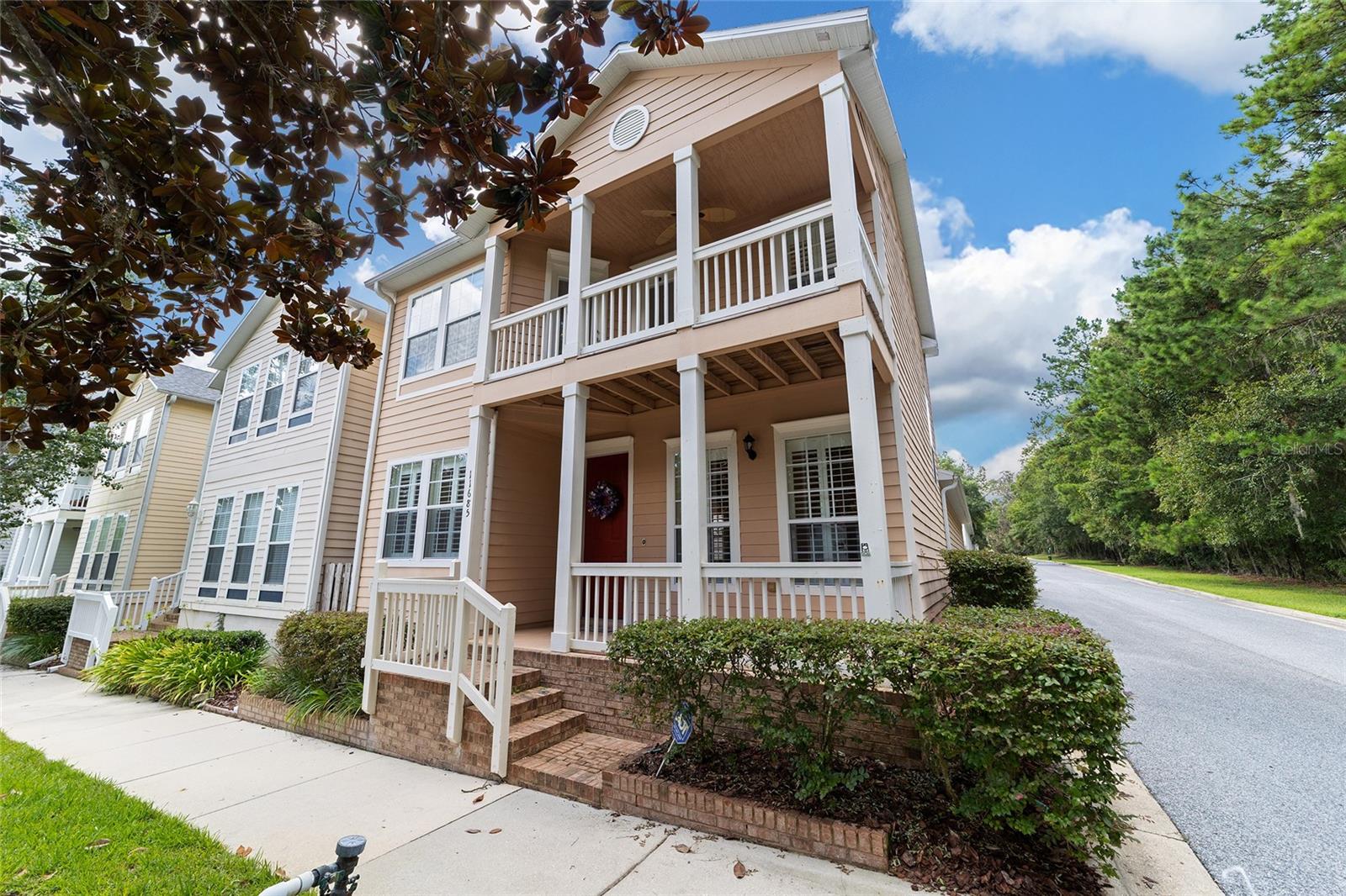 Corner-Lot Beauty with Upstairs Balconies in Prime Gainesville Location! Welcome to this stunning residence in the sought-after community of Charleston Park, Fletcher's Mill. Perfectly positioned on a spacious corner lot, this home immediately captures attention with its curb appeal and thoughtful design. Step inside to discover a flowing layout filled with natural light, generous living spaces, and stylish finishes that blend comfort with sophistication. The downstairs primary suite offers the ultimate in convenience and privacy, featuring direct access to the courtyard and garage, as well as the laundry area and a spacious master bath. Upstairs, you’ll find two bright bedrooms and a full bath, each flowing with natural light and designed for comfort. A downstairs half bath ensures that guests and family alike have their needs met no matter where they are in the home. Upstairs, enjoy the charm of private balconies, perfect for sipping morning coffee, unwinding at sunset, or taking in the peaceful neighborhood views. The outdoor living opportunities don’t stop there—whether entertaining friends or simply enjoying quiet evenings, the balconies and yard make every day feel like a retreat. This home is more than just beautiful—it’s also incredibly conveniently located. Just minutes from shopping, dining, top-rated schools, healthcare, and Gainesville’s vibrant amenities, you’ll love the balance of privacy and accessibility. Commuting is easy, and with parks and recreation nearby, there’s always something to enjoy.
From the thoughtful floor plan with its main-level master retreat to the inviting balconies and unbeatable proximity to everything Gainesville, this home is one you don’t want to miss!