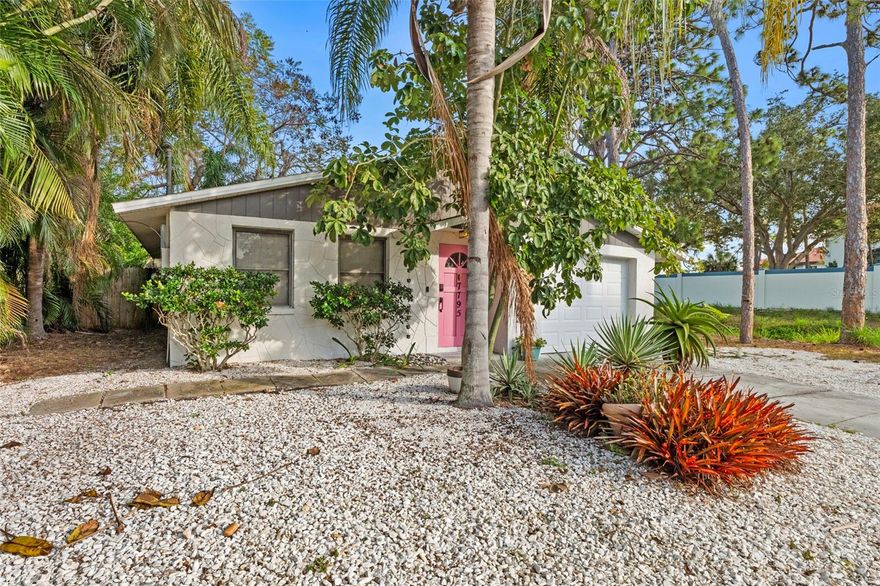 Are you in search of the ideal turn-key home just 4.6 miles from the stunning beaches of Siesta Key? Nestled at the end of a tranquil cul-de-sac beside a serene creek, this Sarasota gem is waiting for you. With a beautifully designed zero-scaped front yard, you'll spend less time on maintenance and more time enjoying life. As you enter, you'll be greeted by a spacious and inviting great room, perfect for both relaxation and entertainment. The luxury vinyl flooring throughout makes for effortless cleaning and adds a touch of elegance. The open kitchen boasts generous cabinet space, gleaming quartz countertops, modern appliances, and a large island complete with a built-in breakfast bar—a perfect spot for casual meals. The delightful owner's suite provides convenient access to the Florida room and features an ensuite bathroom with a stunning porcelain accent wall, adding a touch of luxury to your everyday routine. The extra-large guest bedroom is an excellent space for visiting family or friends, with direct access to the lanai. This charming outdoor area is perfect for enjoying your morning coffee or unwinding with cocktails in the evening. Step outside and discover thoughtful amenities such as an outdoor tiled shower, a cozy fire pit, and a handy storage shed—everything you need for a relaxed, enjoyable Florida lifestyle. Located close to vibrant beaches, shopping, dining, and all that Sarasota has to offer, this is Florida living at its finest. Whether you are looking for the next place to call home or looking for a thriving income producing investment property this could be your perfect match!