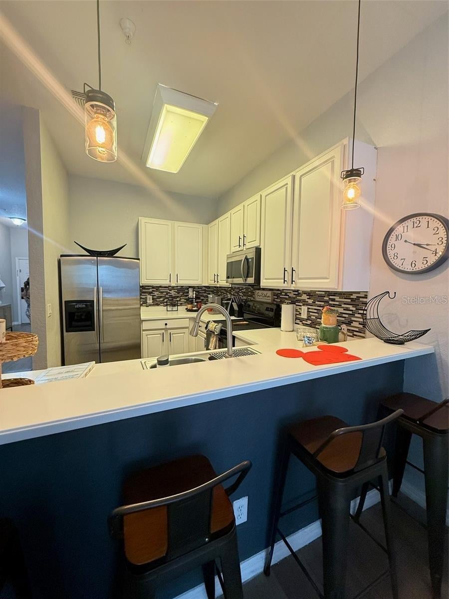 Photo of 115 Rogues Retreat #115, Davenport, FL 33897 (MLS # S5158123)