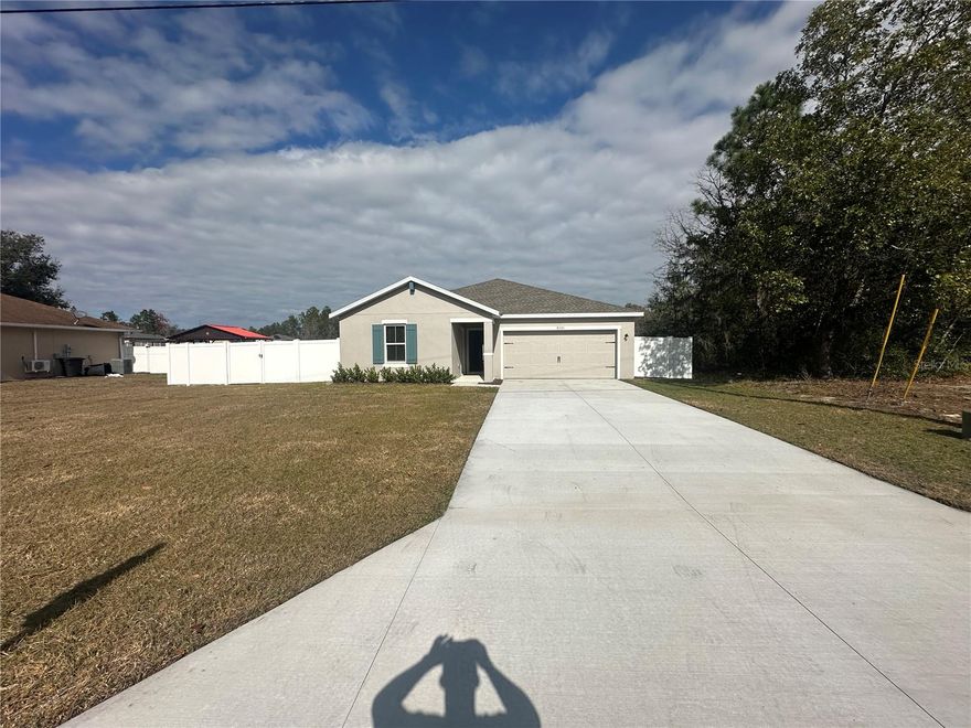 Discover this brand-new rental home in Ocala, offering modern comfort, space, and privacy. The property features a separate annex/in-law suite, perfect for extended family, guests, or a home office setup.

The home is completely carpet-free, showcasing easy-to-maintain flooring throughout. Enjoy outdoor privacy with a full vinyl fence surrounding the entire property, ideal for relaxing or outdoor activities.

Situated on a spacious 0.25-acre lot, this home offers no rear neighbors, providing a peaceful and open backyard setting rarely found in rental properties.

This is a perfect opportunity to rent a new, low-maintenance home with extra living space, privacy, and modern finishes in a growing Ocala area.