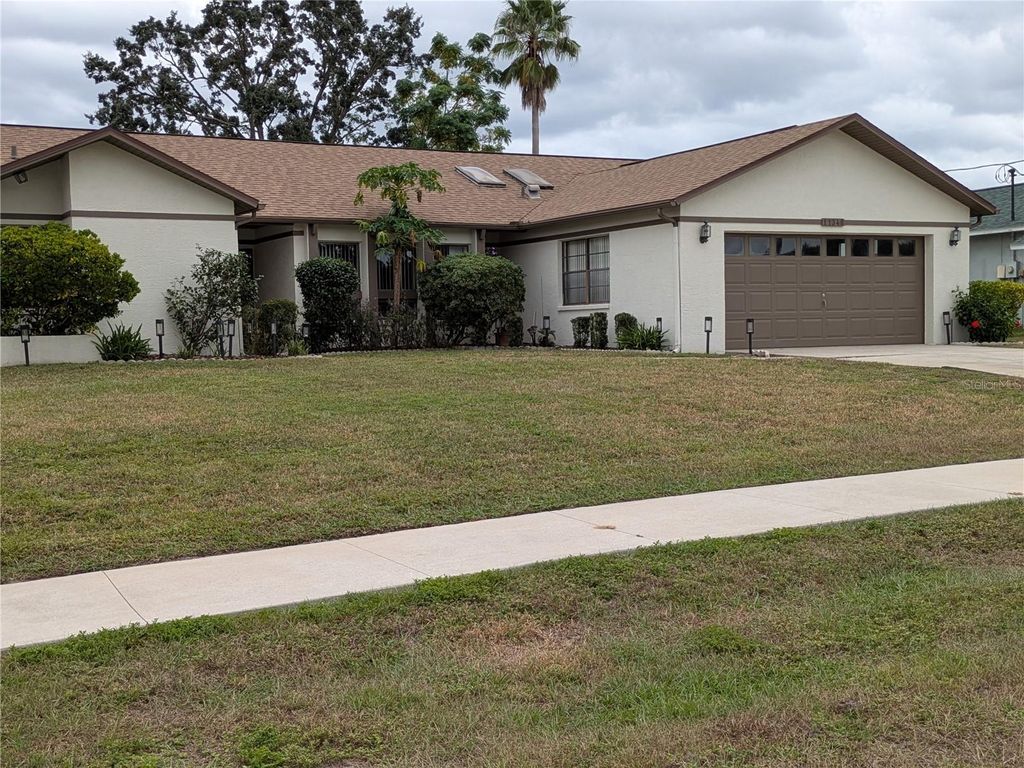 Photo of 11348 Timbercrest Road, Spring Hill, FL 34608 (MLS # TB8439998)