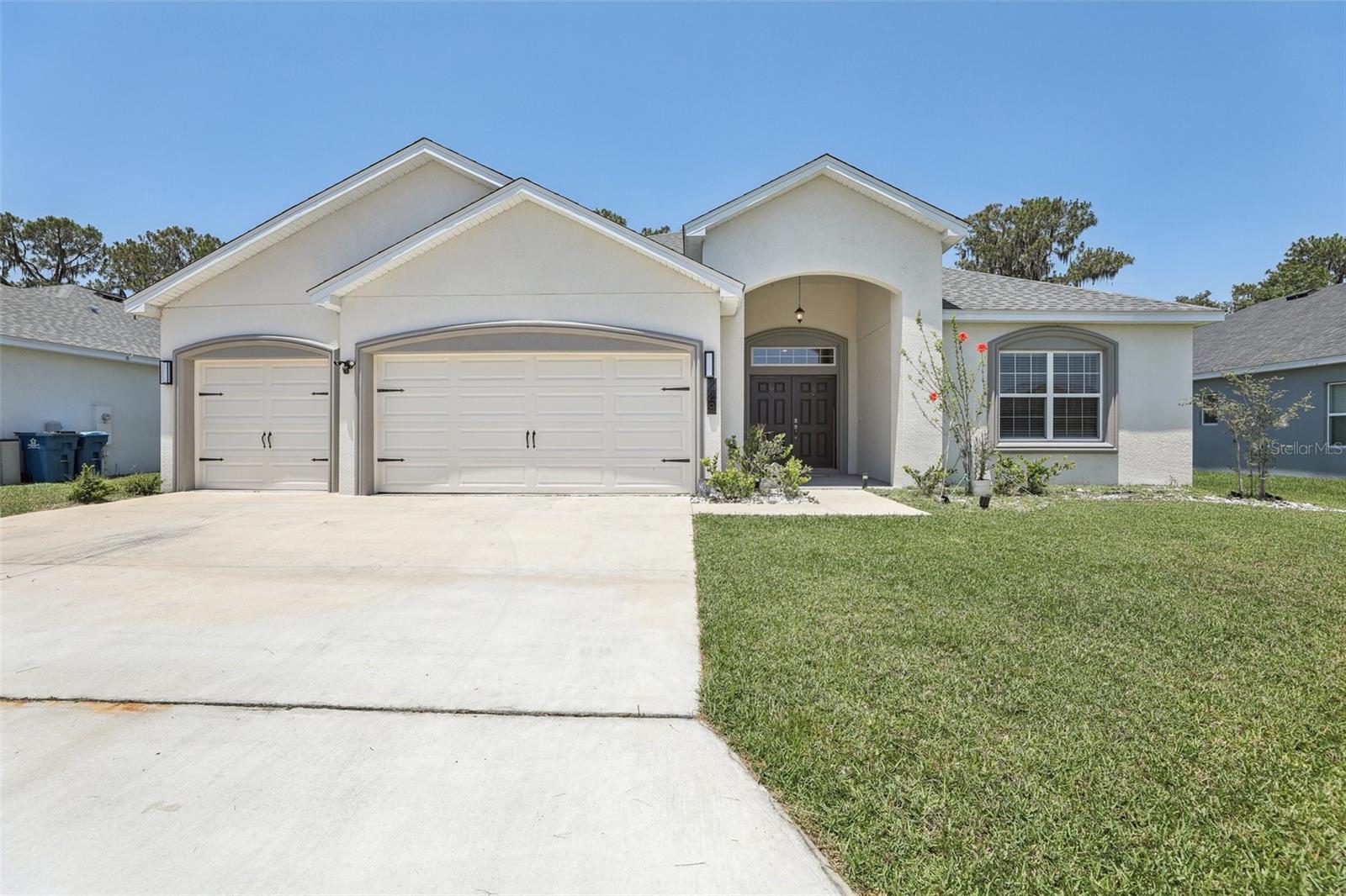 Get ready to fall in love with this gorgeous, single-story home that’s big on style and even bigger on comfort — and with no CDD and a super low HOA, it's a win all around. Sitting on one of the most private lots in the neighborhood (no rear neighbors!), you’ll enjoy peaceful water views — perfect for chilling out after a long day.
Inside, the open floorplan is made for real life — think five roomy bedrooms, a flexible den, three full bathrooms, and a huge three-car garage with smart Wi-Fi openers. The whole place is full of upscale touches like luxury vinyl plank flooring, designer kitchen cabinets, and modern bathrooms. The primary suite? Total retreat vibes, with spa-like finishes, gorgeous tile, and classy cabinetry.
There’s more: upgraded appliances, sleek recessed lighting, ceiling fans throughout, and stylish paint that ties everything together. Love the outdoors? The lanai, and fenced backyard are ready for relaxing. The front lawn and flower bed areas have a Rain Bird in-ground sprinkler system for our drier months.
Plus, this home is smart and efficient, with a water softener and blinds already installed on every window for that extra layer of privacy.
Location-wise, you’re in the highly-rated Mulberry School District and just minutes from local hot spots like Reasy Donuts, the new food hall, and Seven Wetlands Park. Commuting’s easy too, with quick access to FL-570, I-4, and Tampa.
Homes like this — with this much space, privacy, and upgrades — don’t come around often. Come see it for yourself and find out why this one’s a must-see!