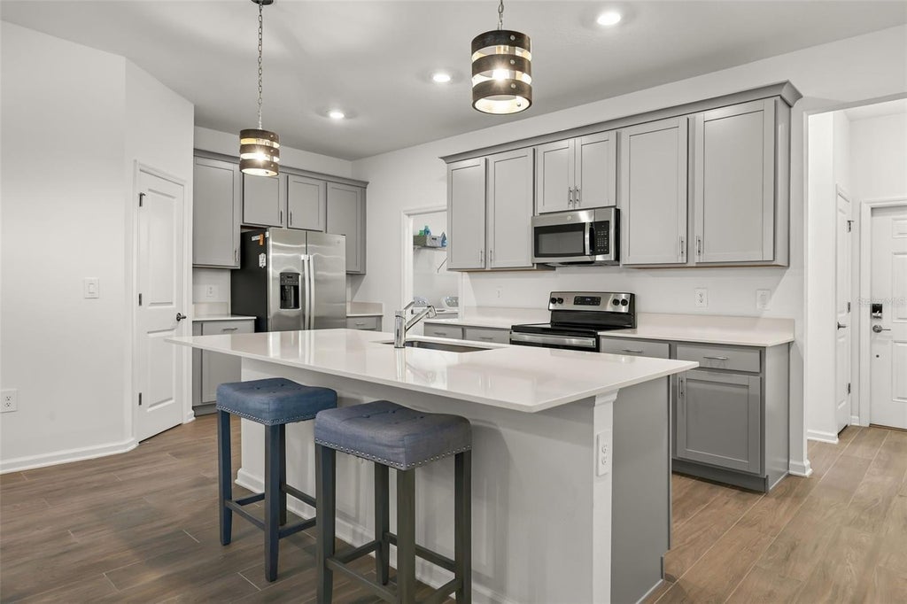 Photo of 1543 Cross Prairie Parkway, Kissimmee, FL 34744 (MLS # O6451913)