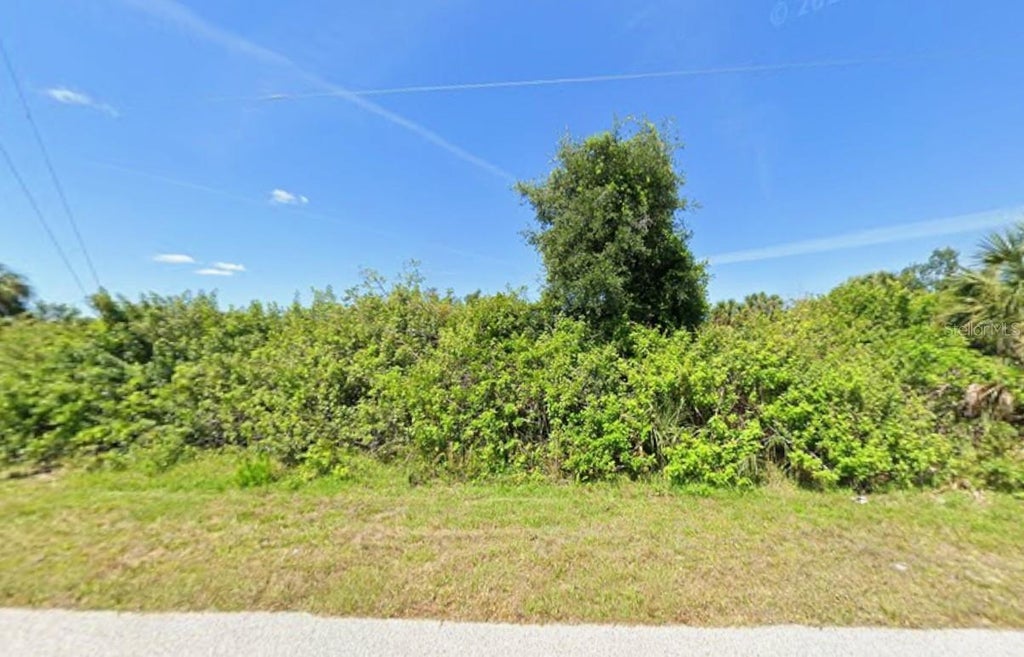 Photo of 7009 Manniz Road, Port Charlotte, FL 33981 (MLS # C7530913)