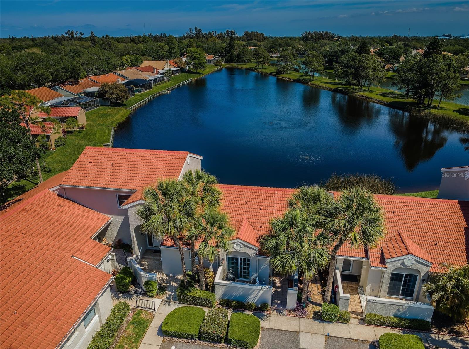 Captivating water views provide serenity from all living spaces in this superbly updated townhome-style condo. Nestled in Placido Bayou, one of St. Pete's few gated communities. Residents in this neighborhood enjoy the Bayou's privacy yet experience all the benefits of its proximity to downtown, beaches, golf & tennis clubs, and 2 international airports. The aesthetics of this modern 3-bedroom, 2.5-bath are coastal and open, especially with the gourmet kitchen anchoring the dining room, living space & bonus room with water views and a storage closet. Moving in is simple with the updates of the home. A fully remodeled kitchen with generous cabinet space and granite countertops and a modern half bath on the main level. The oversized primary bedroom has an en-suite bathroom with shower & large walk-in closet. Two additional bedrooms are also located upstairs. One of the bedrooms also features and en-suite bathroom with a tub and walk-in closet. The third bedroom features beautiful water views, a standard closet and a nook perfect for desk space. The unit also features updated flooring (no carpet), new lighting and a full size washer and dryer. Bringing furry friends with you? No problem, a pet is allowed with a non-refundable pet fee. The property is not fenced. One designated parking spot and lots of additional guest spots for a second car or guests. As an added bonus, a sparkling community pool is steps away. See more by clicking the video tour. Annual rental only.
